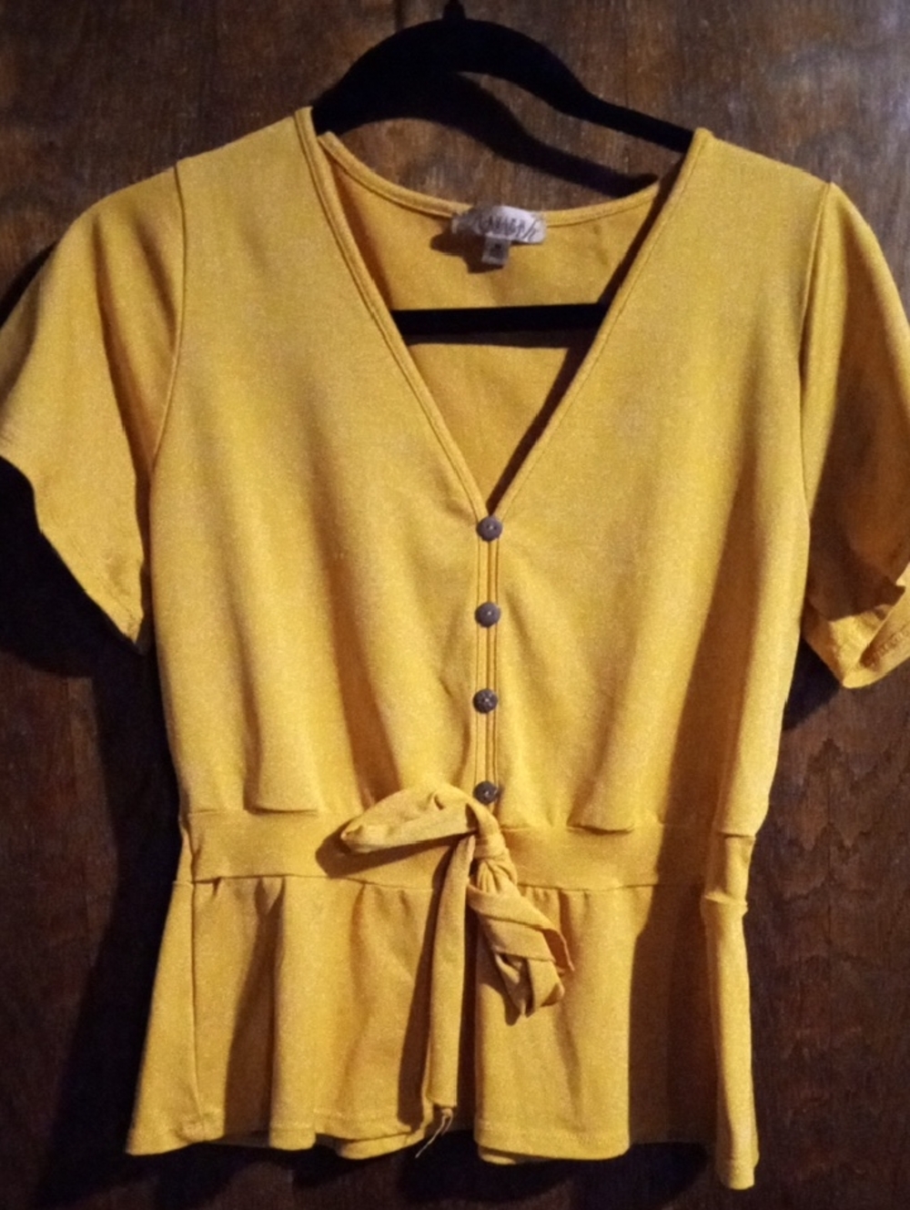 Lavish Yellow V-Neck Button Tie Peplum Blouse